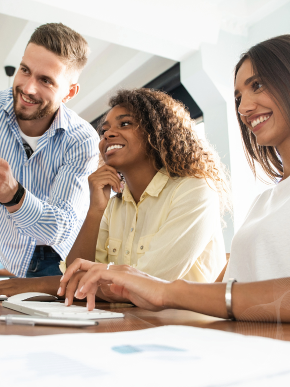 Three employees collaborating on a project